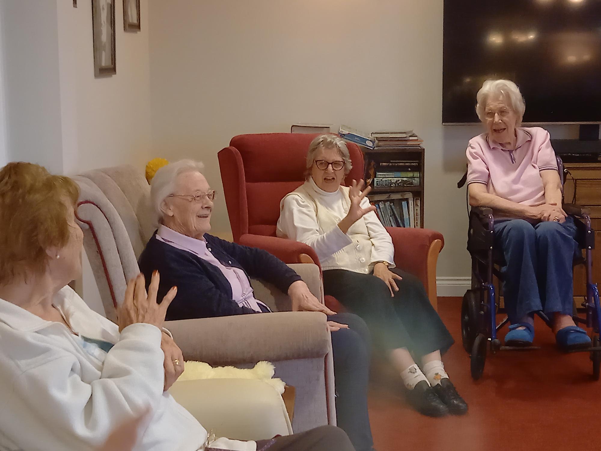 Cheltenham Scouts and Windsor Street Care Centre residents sing